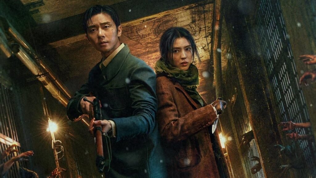 Jang Tae-sang, interpretado por Park Seo-joon, e Yoon Chae-ok, vivida por Han So-hee, armados em cena de A Criatura de Gyeongseong.