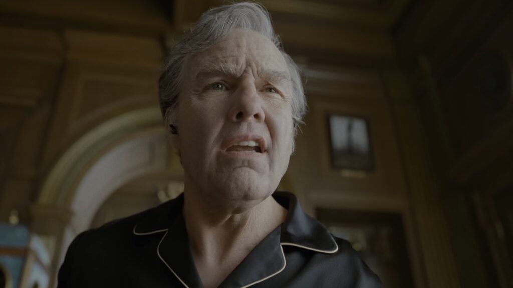 Tom Cruise caracterizado como Digger Rockwell em cena do trailer oficial de Digger.