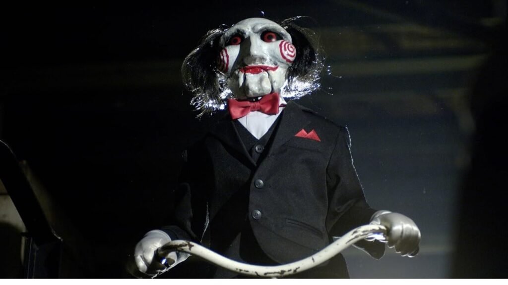 Jogos Mortais terá novo filme dirigido por Mike P. Nelson e produzido por James Wan 1 Boneco de Jigsaw em Jogos Mortais